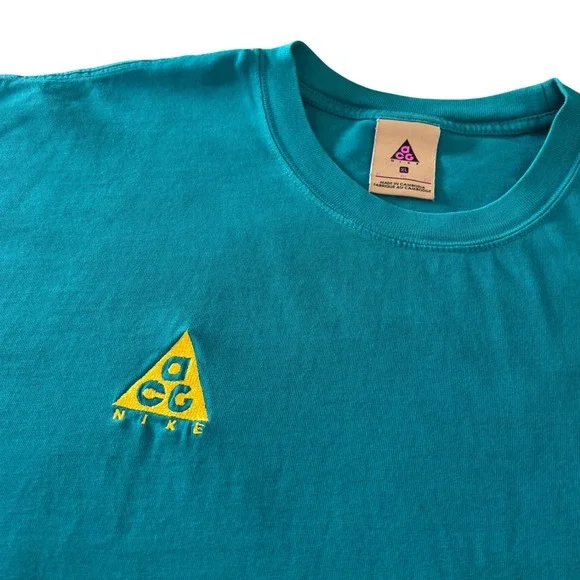 Nike ACG Teal Blue Yellow Embroidered Triangle Logo Short Sleeve Mens T-Shirt XL - Picture 1 of 6